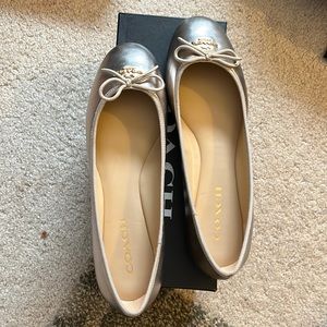 Coach flat in champagne color size 10